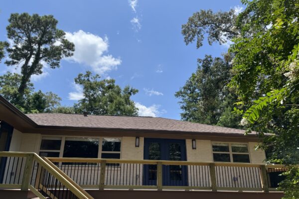 A House With Trees In The Background